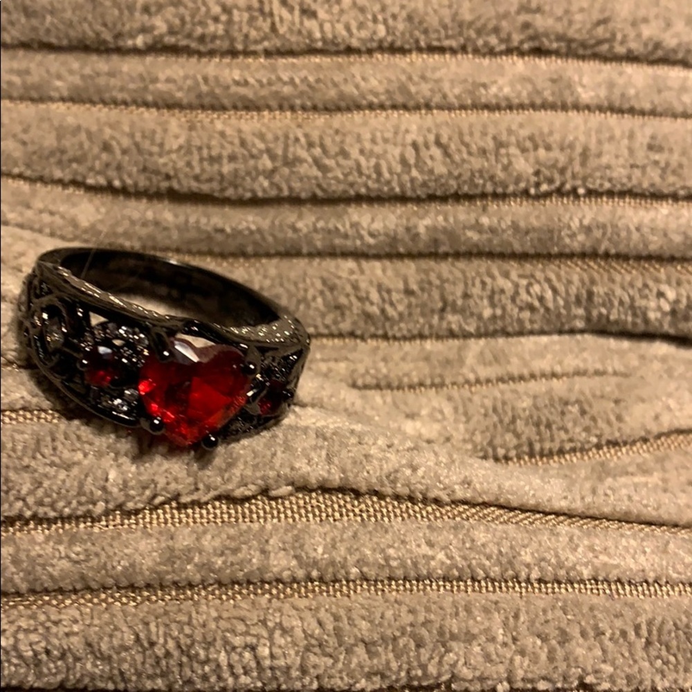 Beautiful ruby heart ring with accents crystals